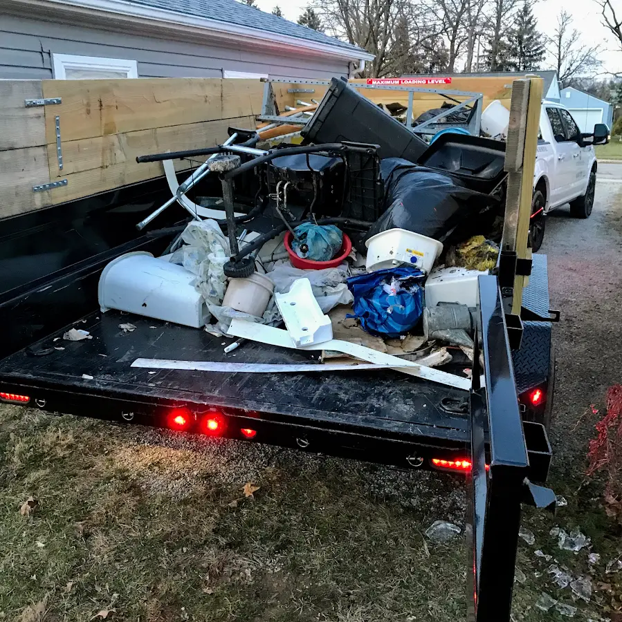 Roll-off dumpster delivered to a residential driveway in Monroeville